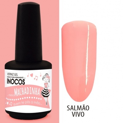 Frasco de verniz gel INOCOS cor salmão vivo com rótulo rosa e amostra da cor do verniz.