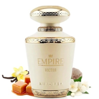 Frasco creme e dourado de perfume Empire Victor Khadlaj com elementos naturais ao redor