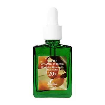 Frasco verde de vidro com sérum de vitamina C e conta-gotas branco.