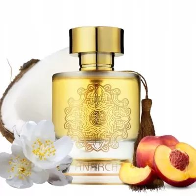 Frasco de perfume dourado com flores, coco e pêssego