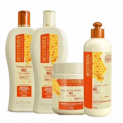 Conjunto de produtos de cuidados capilares Bio Extratus Mel com embalagem branca e detalhes laranjas