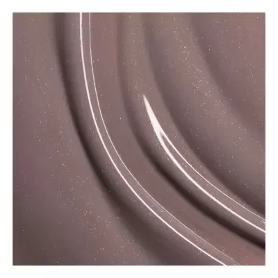 Líquido translúcido cor de rosa com brilho e partículas brilhantes