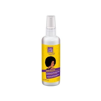 Spray capilar branco com rótulo amarelo e ilustração mulher cabelo afro