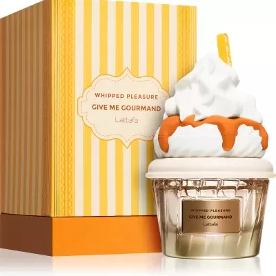 Perfume Whipped Pleasure Give Me Gourmand da Lattafa em frasco decorativo com caixa amarela às listas.