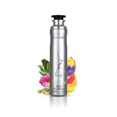 Frasco metálico prateado de purificador de ar com frutas e flores ao fundo