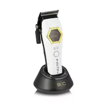 Máquina de cortar cabelo branca e preta com base de carregamento preta