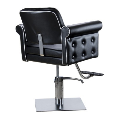 Cadeira de cabeleireiro preta em couro com base metálica