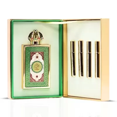 Conjunto de perfume com frasco principal decorativo e quatro frascos pequenos em caixa aberta