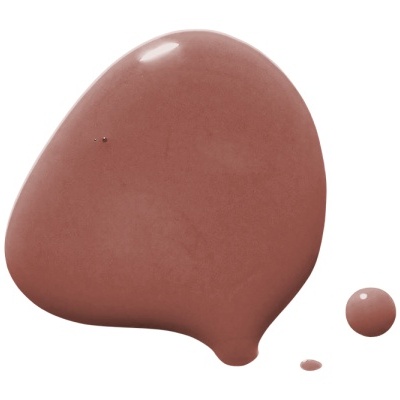 Manchas de produto líquido de maquilhagem castanho-rosado