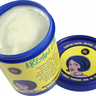 Frasco azul e amarelo de creme Argan Oil com texto e ilustração de mulher no rótulo