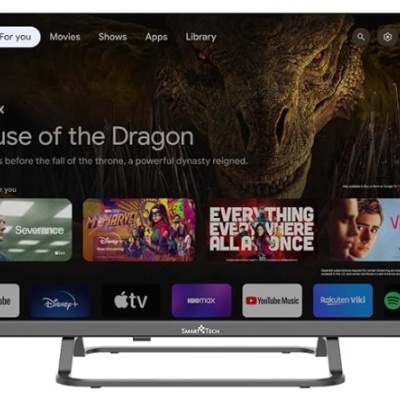 Televisor plano com interface HBO Max e várias sugestões de séries e aplicações.