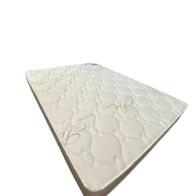 Colchão branco com padrão acolchoado e texto Dream Design