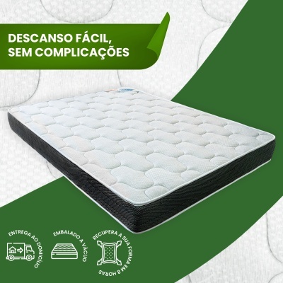 Colchão branco acolchoado com lados pretos e texto promocional em fundo verde