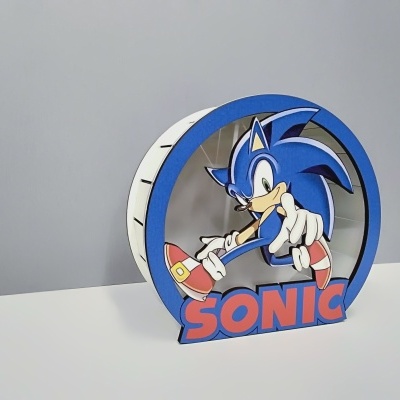 Ratoeira redonda decorativa com personagem Sonic azul e texto SONIC