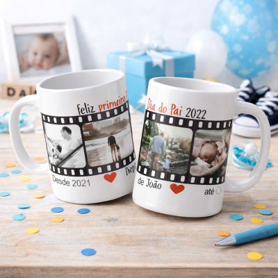 Duas canecas brancas personalizadas com fotos e texto sobre o Dia do Pai em Português, colocadas numa mesa com confetes coloridos e presentes ao fundo.