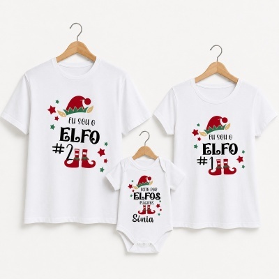 Conjunto de três roupas brancas com design de elfos e texto em português.