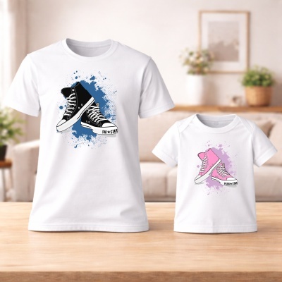 T-shirts brancas com estampas de ténis pretos e rosa, com textos PAI STAR e FILHA STAR.