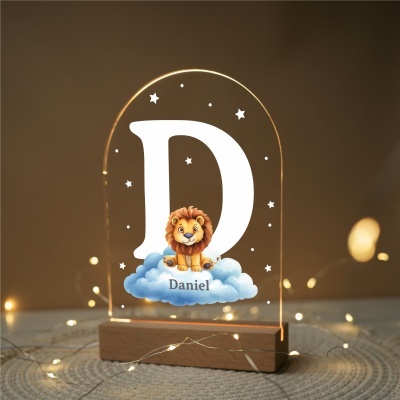 Luminária decorativa iluminada com letra D, leão e nome Daniel