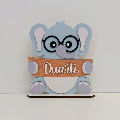 Decoração de elefante azul com placa de madeira Duarte
