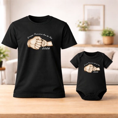 Conjunto de t-shirt e body pretos para pai e filho com ilustração e texto em branco