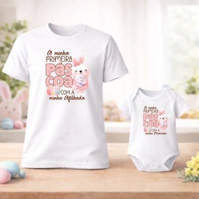 Camisola e body brancos com estampados de coelho e texto alusivo à primeira Páscoa