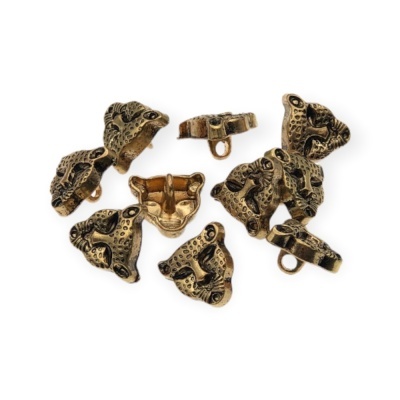 Conjunto de sete contas metálicas douradas em forma de cabeça de leopardo