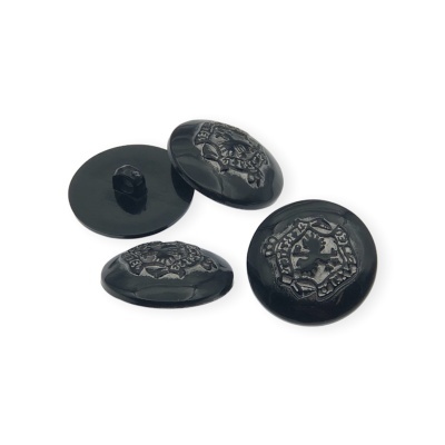 Botões redondos pretos com relevo decorativo