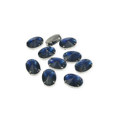Pedras preciosas azuis ovaladas com bases metálicas prateadas