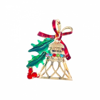 Broche dourado em forma de campainha com laço vermelho e folhas verdes