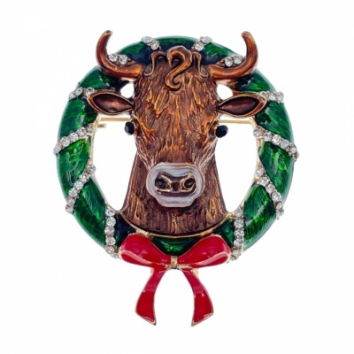 Broche decorativo com motivo de vaca e laço vermelho