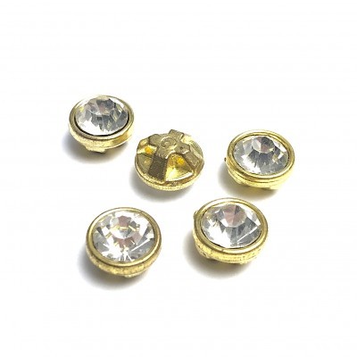 Botões redondos transparentes com base dourada em fundo branco