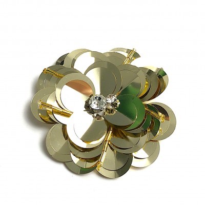 Broche de flor metálico com cristais no centro