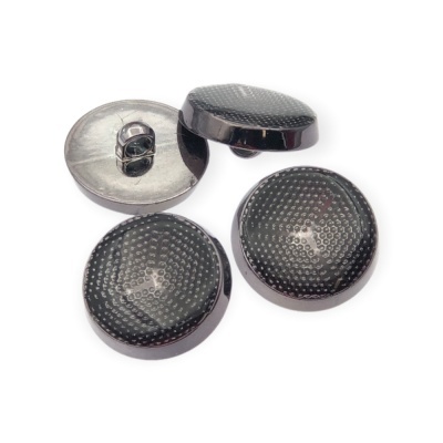 Botões redondos negros texturizados com base metálica