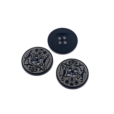 Três botões pretos com e sem design em relevo prateado