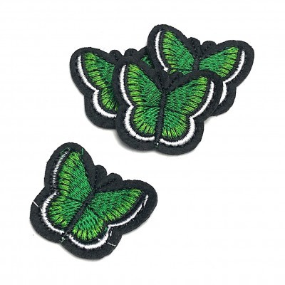 Patches de borboletas verdes bordadas com contorno preto e detalhe branco