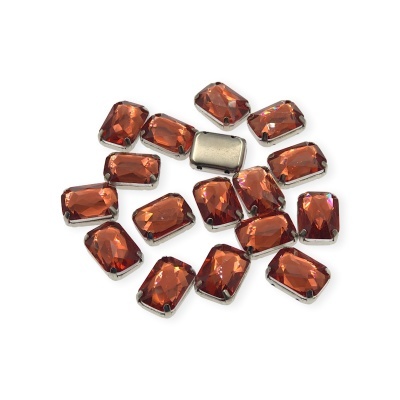 Pedras retangulares de vidro laranja com moldura metálica prateada