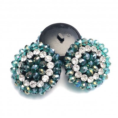 Par de botões decorativos redondos com cristais azul e branco sobre base preta