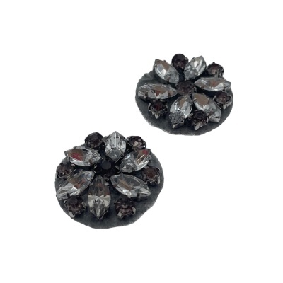 Botões redondos pretos com pedras facetadas castanhas e transparentes