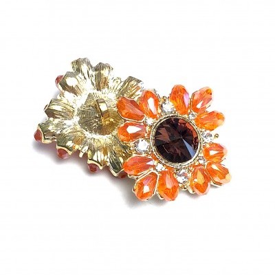 Elástico de cabelo dourado com pedras laranjas e preto em forma de flores
