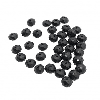 Contas pretas facetadas com furos centrais