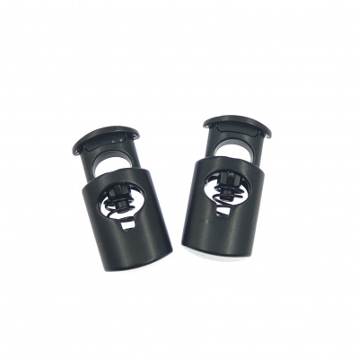 Par de bloqueadores de cordão em plástico preto com mola interna