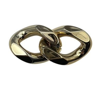 Fecho metálico dourado em forma de elo duplo