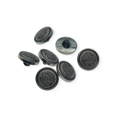 Botões pretos redondos com padrão decorativo em relevo