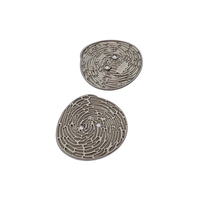 Retentores metálicos circulares com padrões complexos