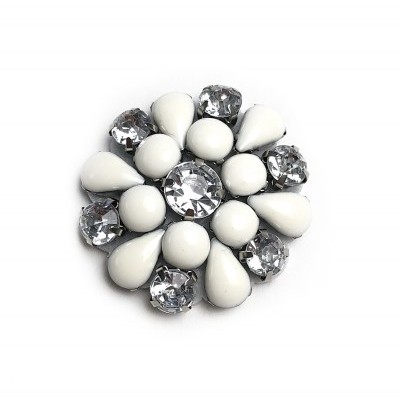 Broche redondo com pedras brancas e transparentes