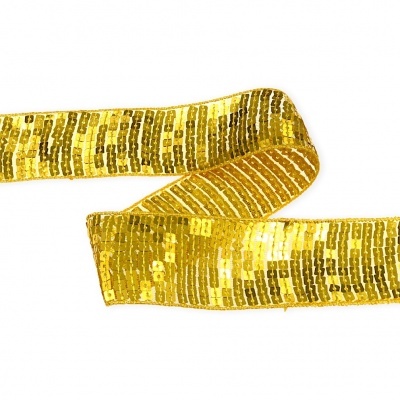 Fita decorativa dourada com lantejoulas brilhantes