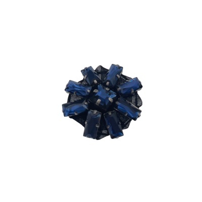 Prendedor de cabelo azul escuro em forma de flor com padrão geométrico