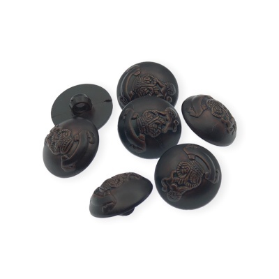 Seis botões pretos com relevo de caveira castanha sobre fundo branco