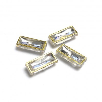 Botões retangulares dourados com superfície transparente