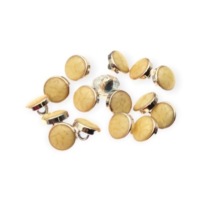 Botões redondos bege com base metálica prateada